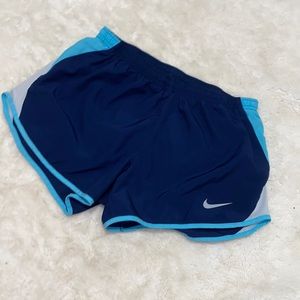 Blue and white nike athletic dri-fit shorts